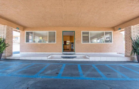 Welcome To The Rodeway Inn Fallbrook - Reception Desk and Office Entrance 